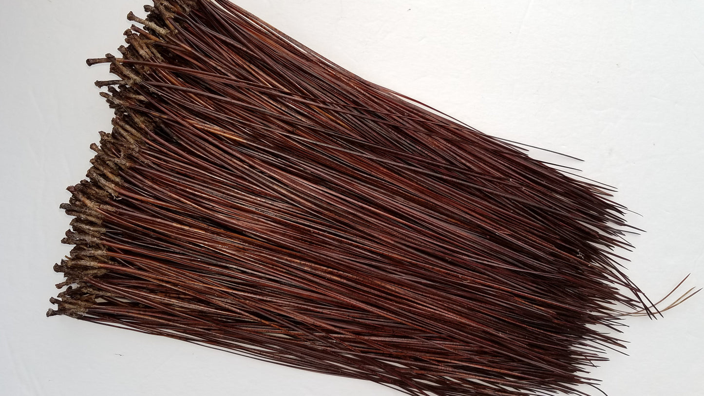 Glycerin treated pine needles can vary in color. The darker ones resemble a rich mahogany color.